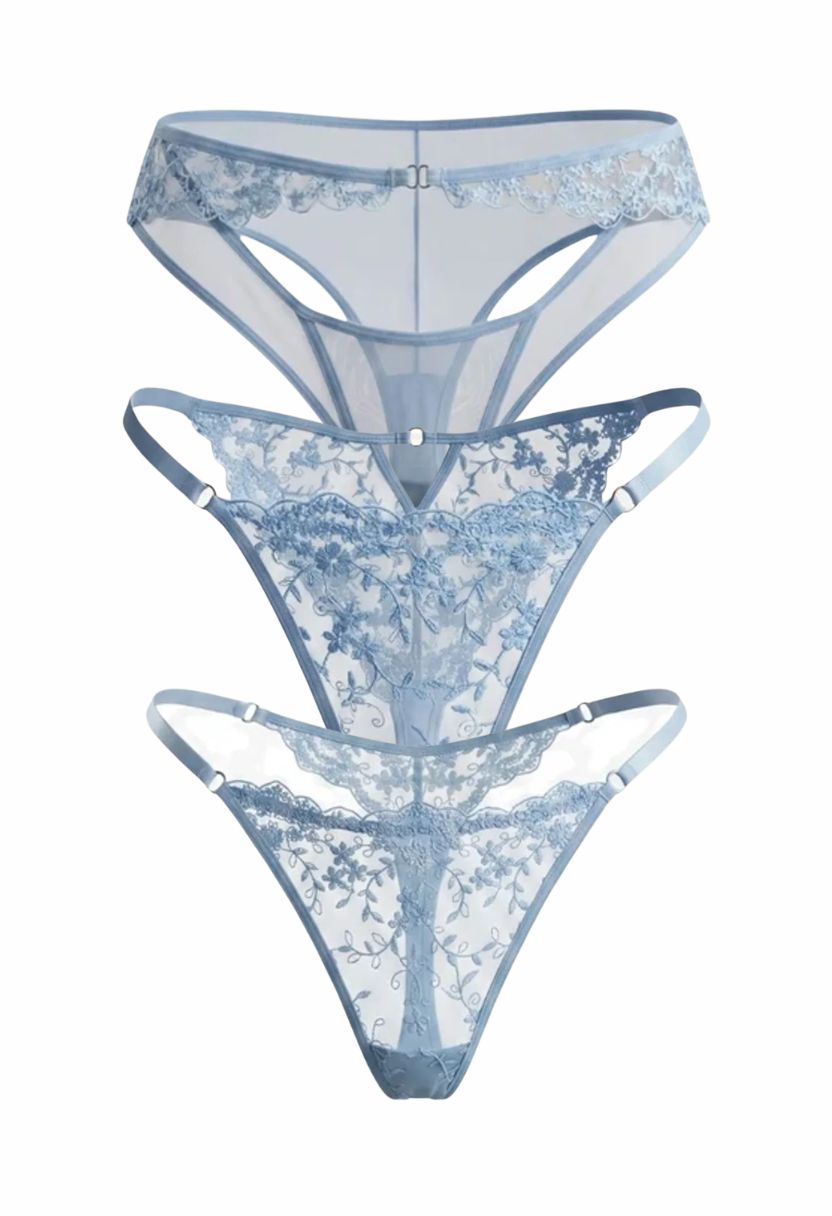 Three pairs of sheer lace thong panties stacked vertically on a plain white background, featuring light blue and white floral lace patterns.