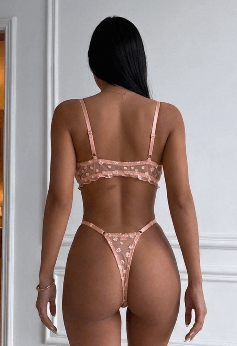 Chamomile peach daisy appliqué mesh bralette and thong on model, back view