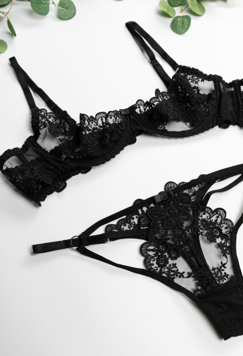 Erotica black open bra and thong lace lingerie set flat lay