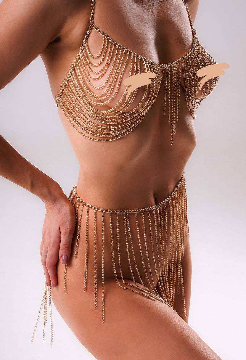 Goddess gold chain bra and skirt set on model, front torso view