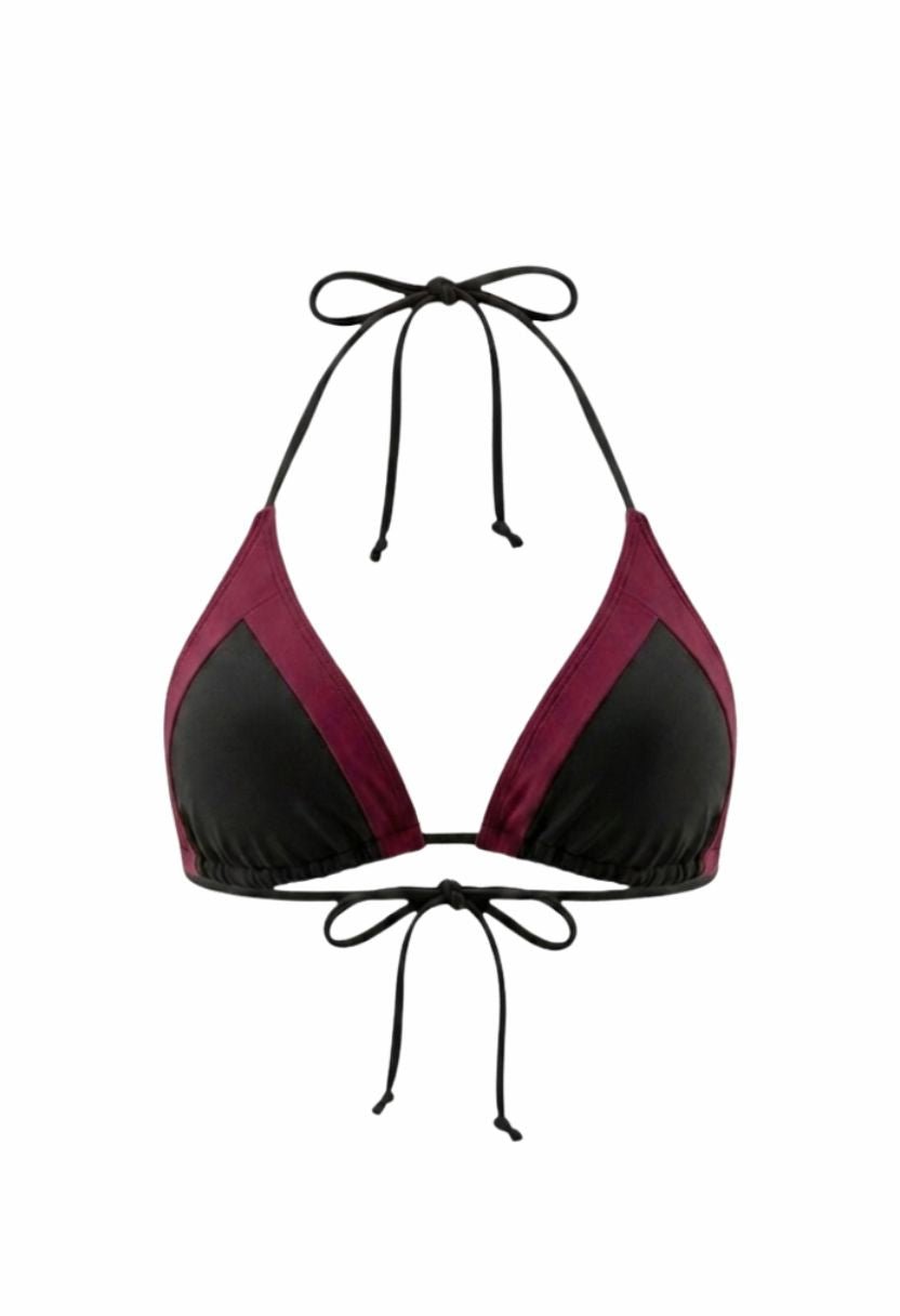 Iris black triangle bikini top with burgundy contrast panels, flat lay