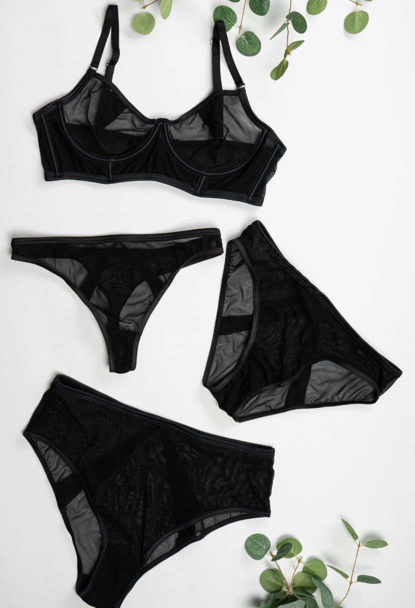 Mia black bra, thong, bikini, and high-waist bikini flat lay
