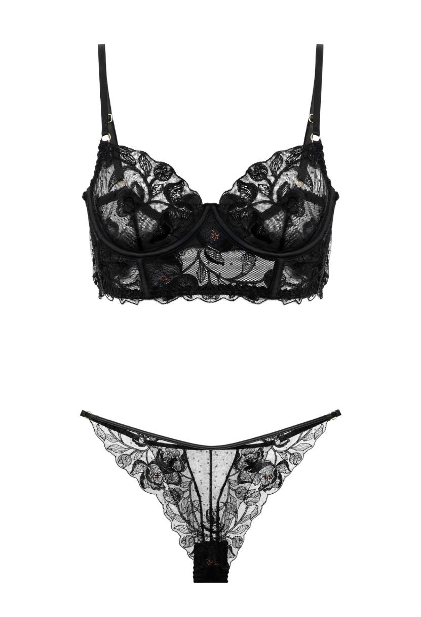 Black lace lingerie set on a white background