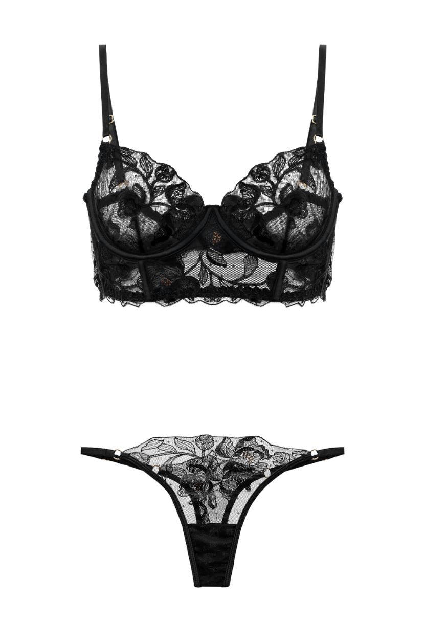 Black lace lingerie set on a white background