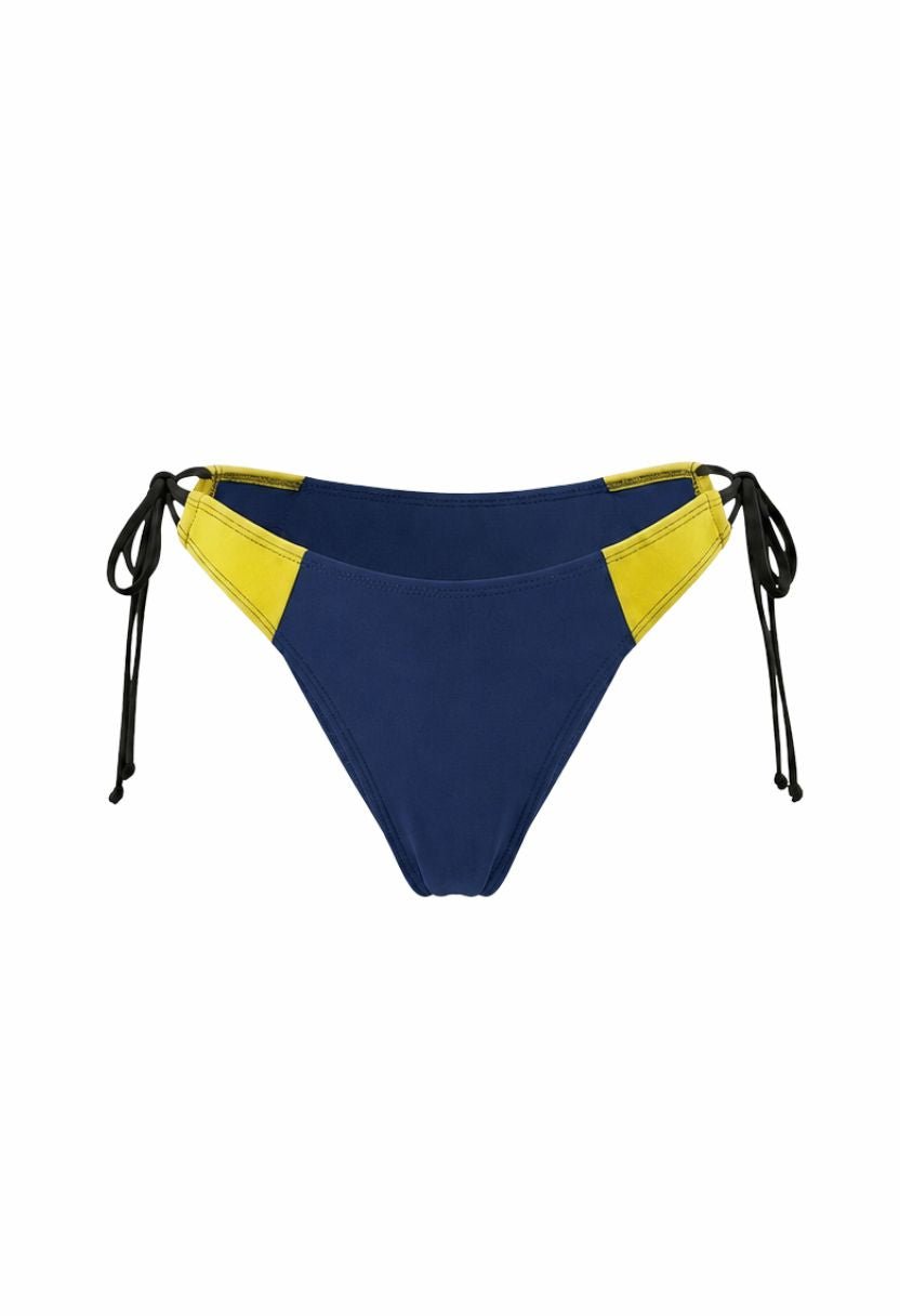 Vera tie-side cheeky bikini bottom navy and yellow colorblock flat lay